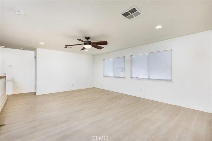 Looking toward the first bedroom, then hall to other two bedrooms