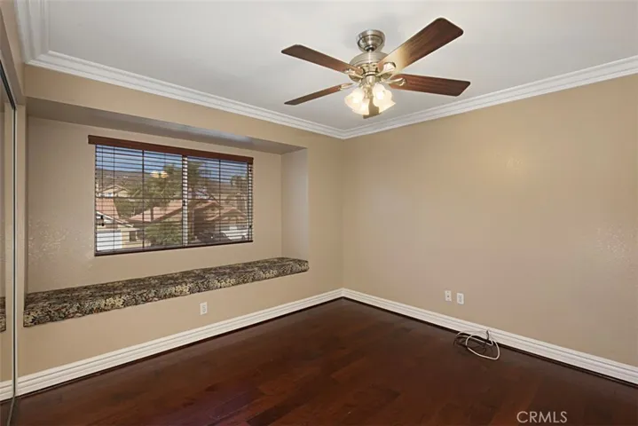 One secondary bedroom has a roomy window seat