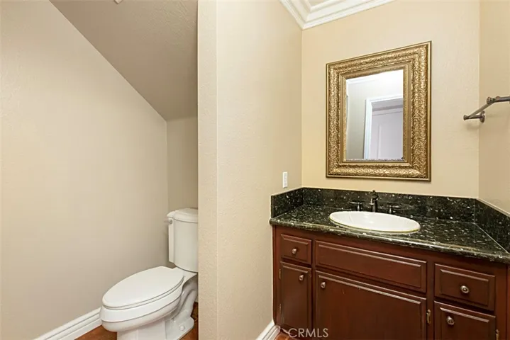 Half bathroom downstairs is perfect for guests
