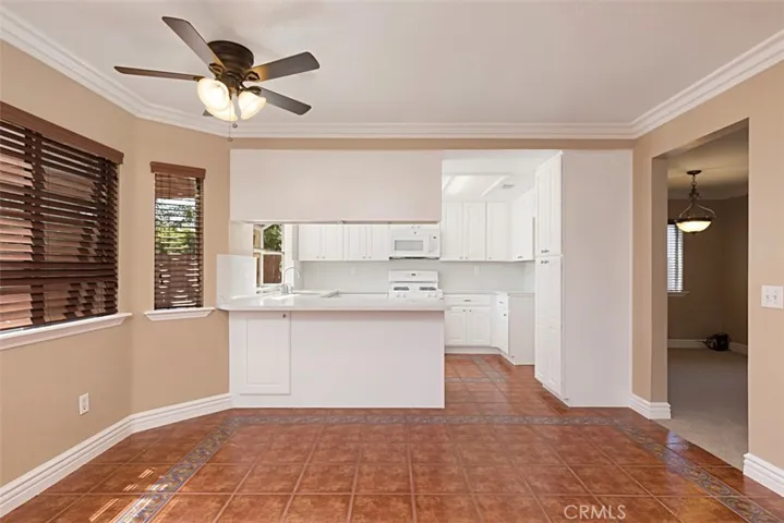 Great casual dining options: a table near the bay windows and/or pull up a stool at the extra-wide peninsula