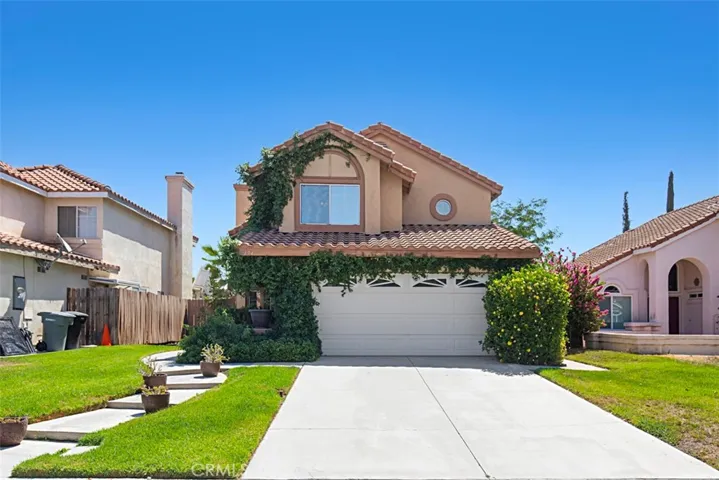 Two car garage plus extra parking in the driveway