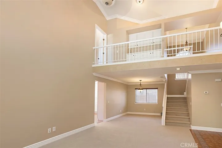 Enter the kitchen through the doorway to the left of the dining room