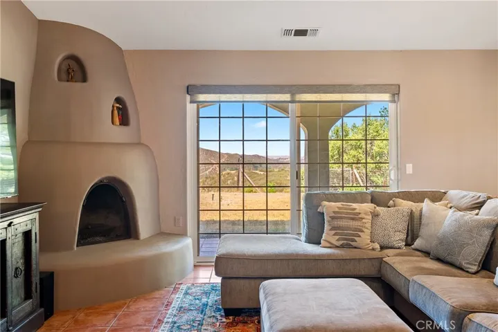 Family Room with Cozy Fireplace.