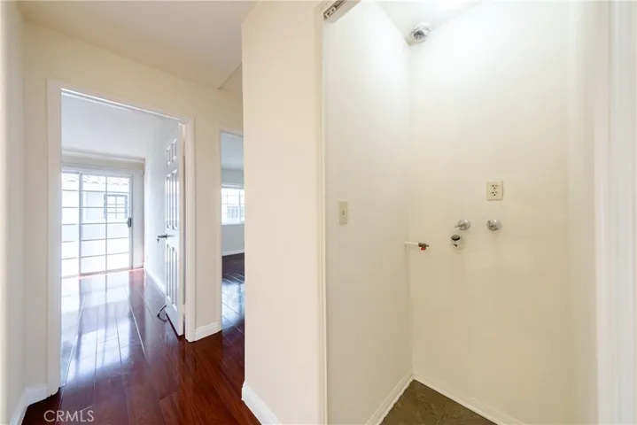 Upstairs closet converted to a washer/dryer closet with hook-ups.