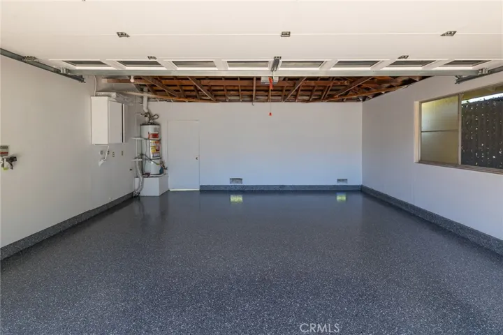 Double Garage with finished walls and new epoxy floor