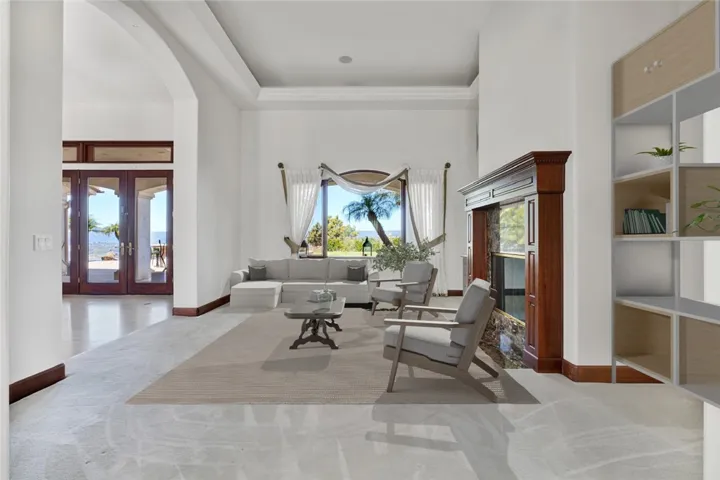 Living Room in-between Front and Back Entrance with Fireplace