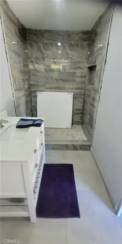 Shower needs to be completed, mirror in shower hung