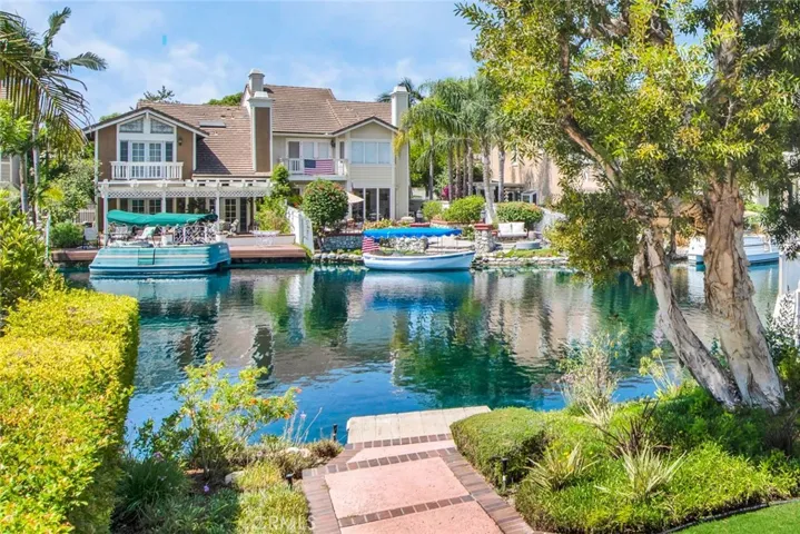 View of backyard and lake