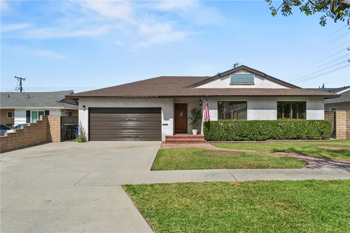 Check out your next home.  Go easily into your 2 car garage and directly into the house.  What a large driveway!