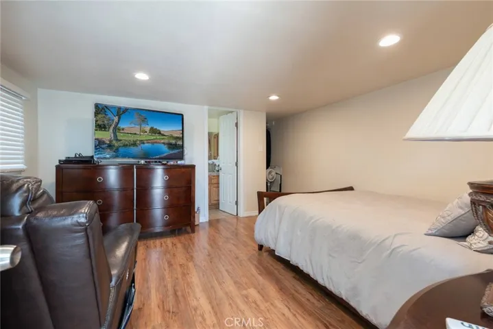 Attached bonus room  with a private bathroom, closet area and more.