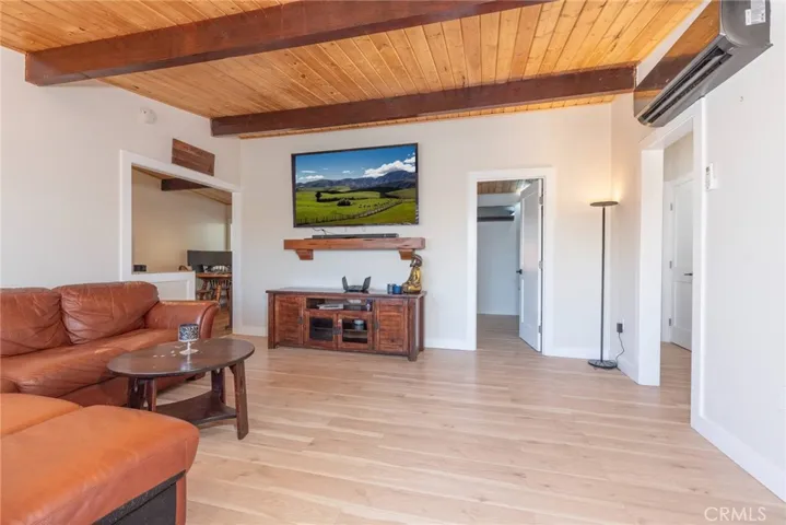 Living Room, Kitchen is to the left, bedrooms are to the right