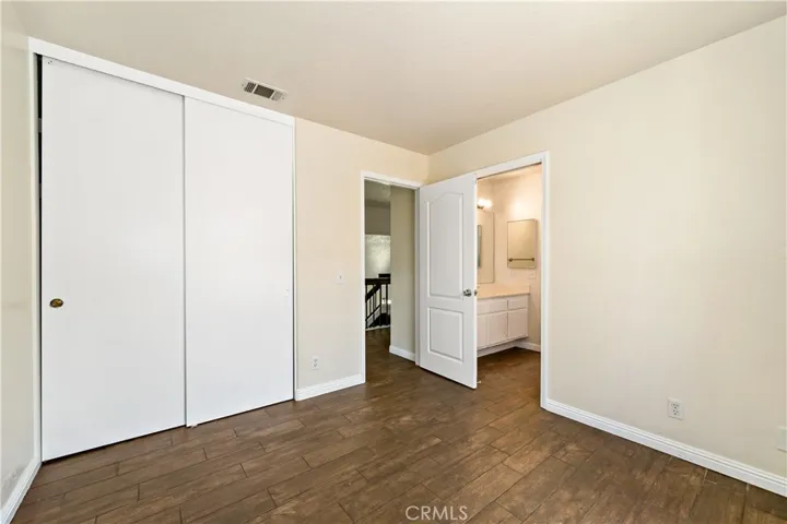 Bedroom #2 w doorway at right leading to 'jack n jill' bathroom