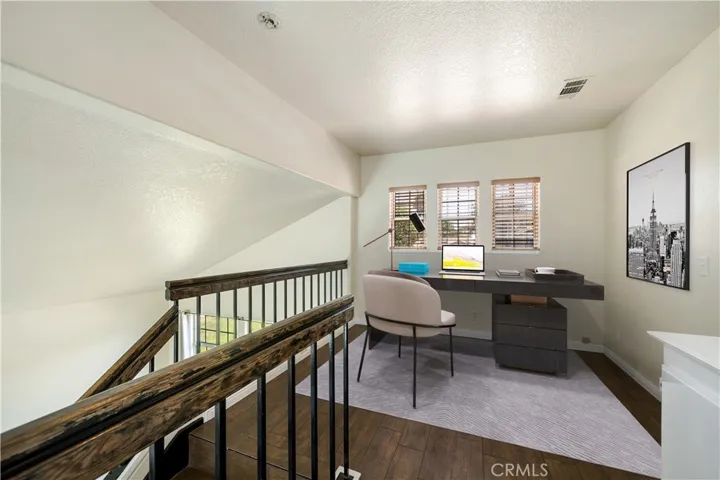 Upstairs bonus area virtually staged
