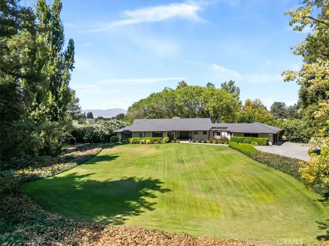 Street view of the whole front yard showing the landscaping