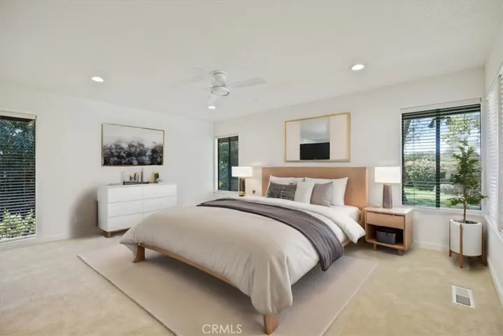 Virtually staged primary bedroom