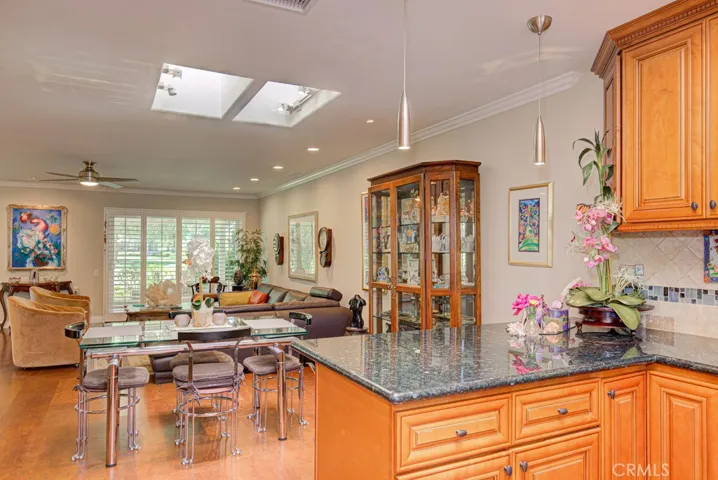 View of the living room and dining area as seen from the kitchen.