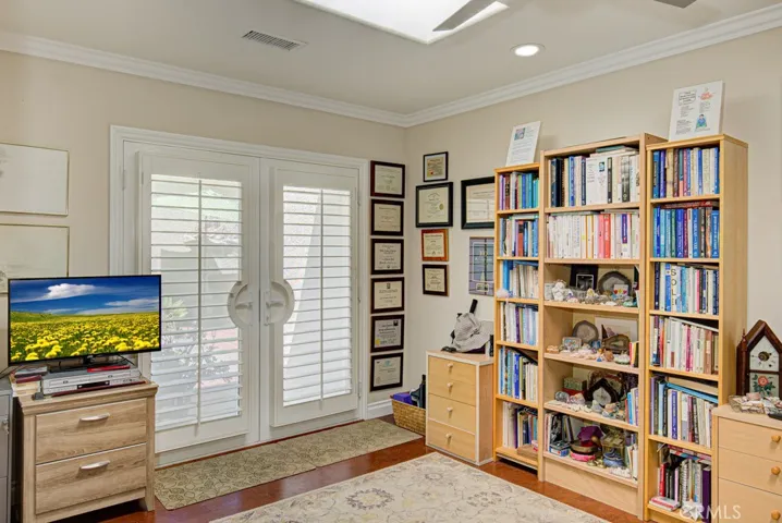 Bonus area of guest bedroom has convenient separate exit to front courtyard.