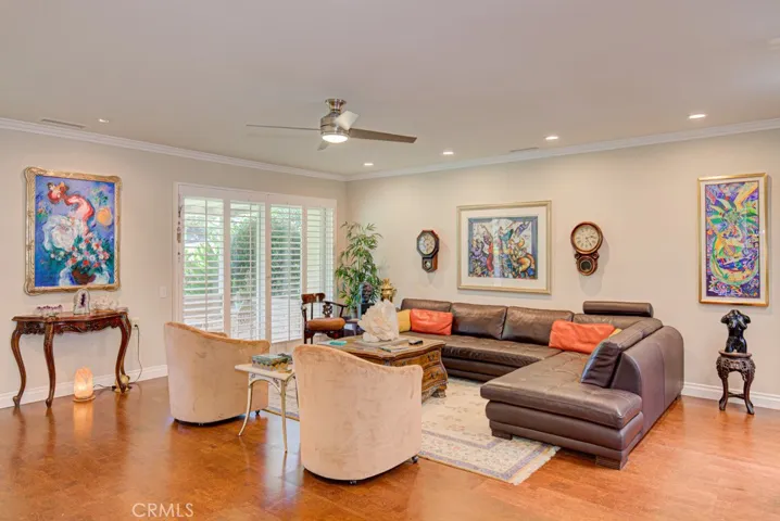 Another view of the living room. Note the direct access to the covered rear patio.