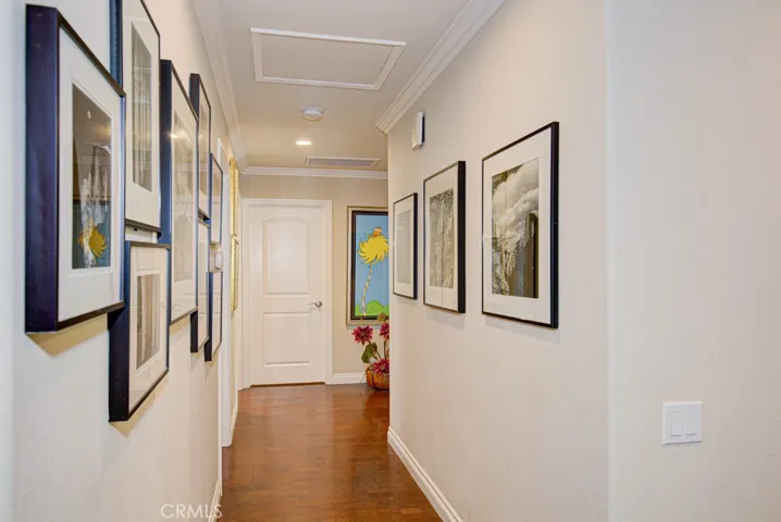 Hallway leading to bedrooms and bathrooms.