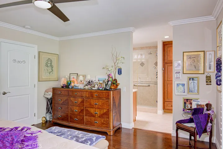 Another view of the primary bedroom suite.