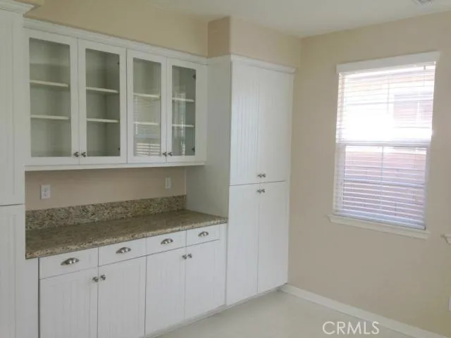 Tons of cabinets and drawers for storage.