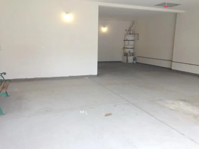 Oversized 3+ tandem garage. Plenty of room for workbenches.