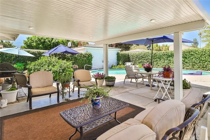 Backyard covered patio with recessed lighting