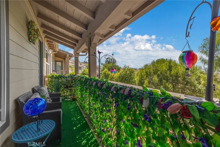 Balcony off family room & primary suite