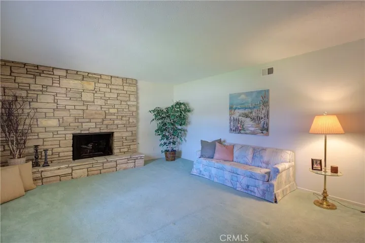 Floor to Ceiling Stone Fireplace with Sitting hearth