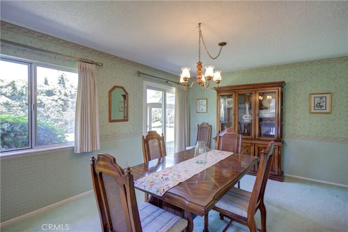 Dining Room with Glass Slider to Backyard