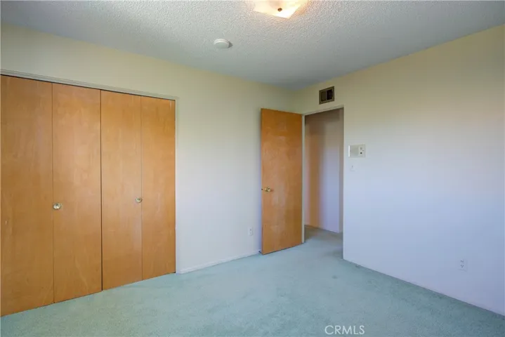 Bedroom 1 wood Closet doors