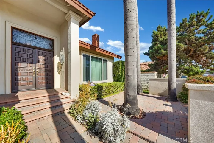 Lovely Front Courtyard abd Double Door Entry