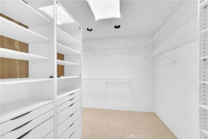 Walk-In Closet with Custom Organizers
