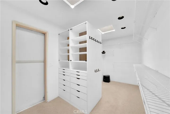Walk-In Closet with Custom Organizers