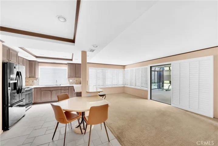 Added Seating Area, Kitchen Open to Warm & Inviting Family Room