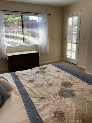 Primary bedroom exit to back yard