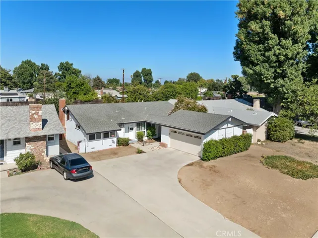 Front with cement driveway