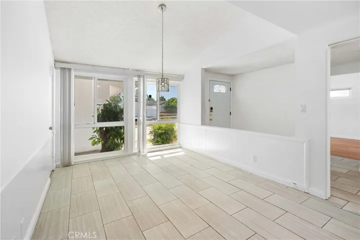 Dining area with a vaulted ceiling