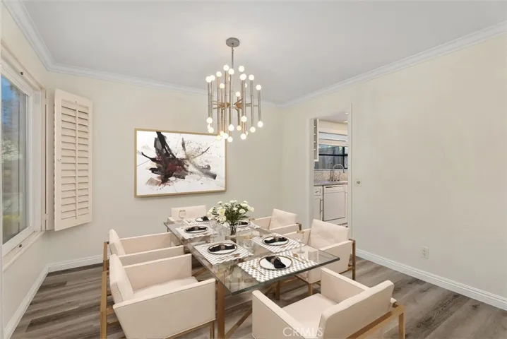 Spacious Dining Room with custom lighting.
