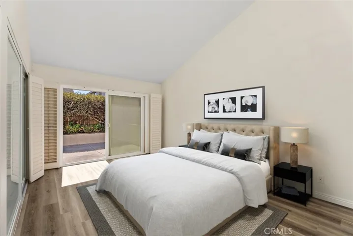 Primary bedroom with custom wall to wall closets.