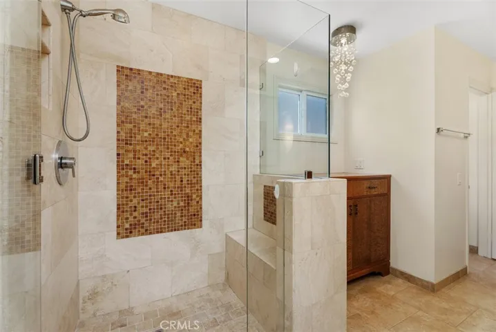 Gorgeous custom remodeled walk in shower in primary bathroom.
