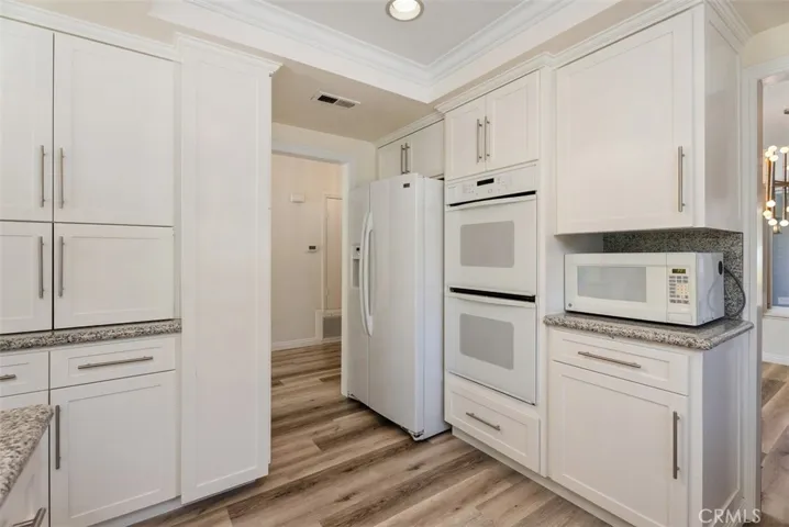 Custom cabinets.
Refrigerator & microwave included.
