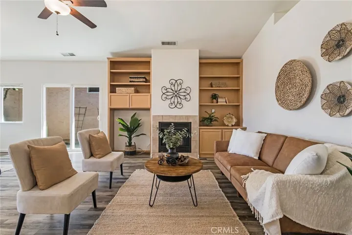 Living Area with gas fireplace insert.
