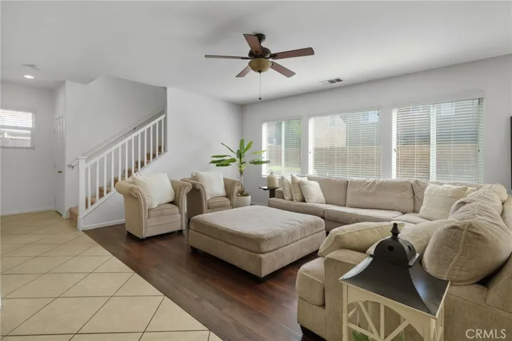 Family Room lit with bright windows.
