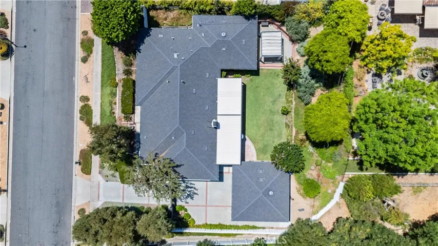Recent upgrades include a newly installed roof with rain gutters and a top-of-the-line Carrier Performance Series High-Efficiency Air Conditioner with Puron, UV lights, and a whole-house fan. This is a smart and healthy home.