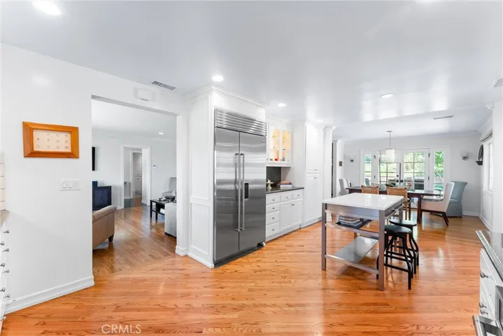 Spacious kitchen enhances the home's inviting floorplan and atmosphere which seamlessly connects all living spaces.