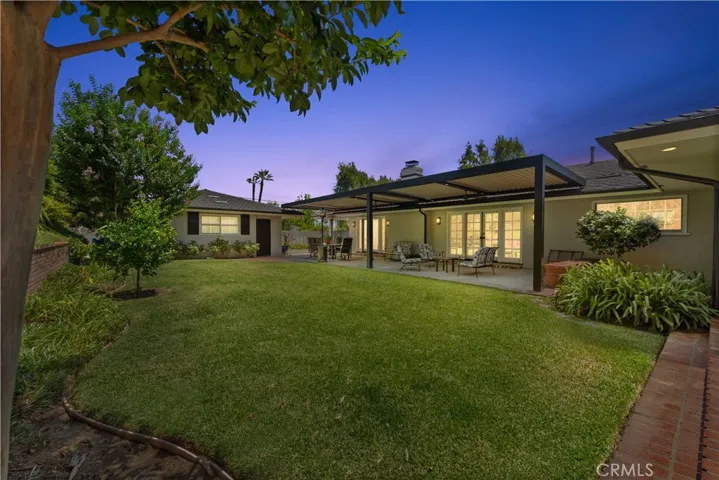 Picture a life of tranquility in this exquisite California Ranch Home, perfectly situated in the highly coveted Raymond Hills community of Fullerton.