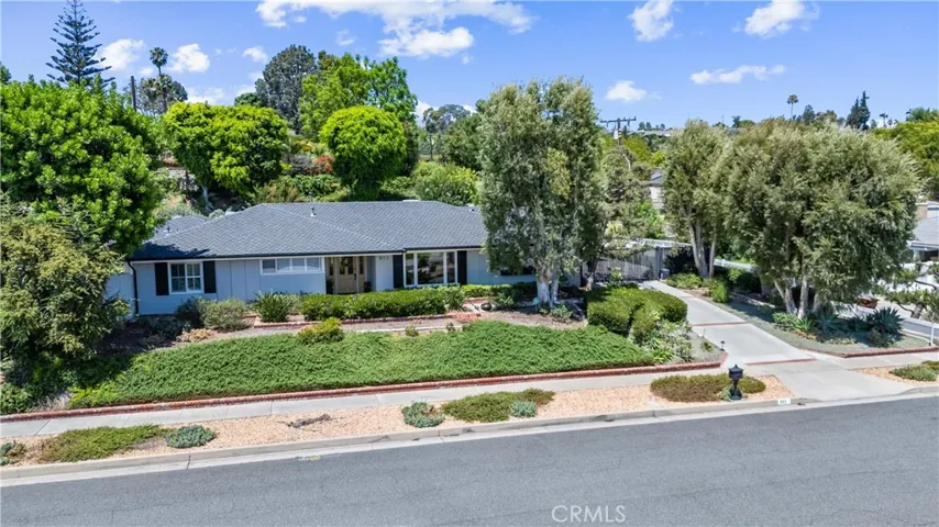 Privacy-Prestige-Curb appeal. Situated on an expansive parcel of land.