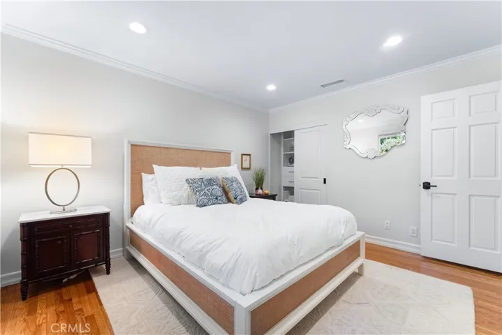 Guests of this bedroom will be smitten by the exquisite finishes and comfortable opulence of this room and home.