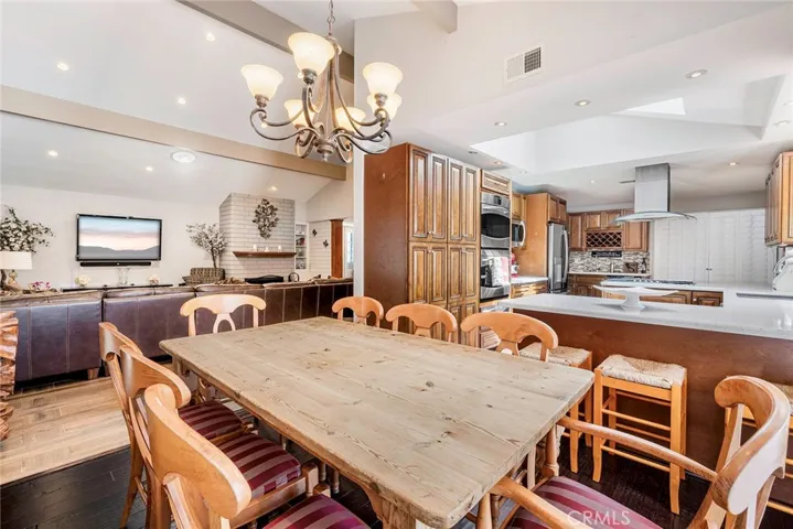 Dining area, living room and kitchen.